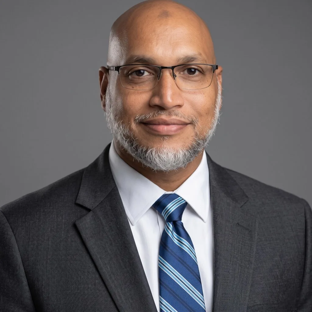 Editorial portrait of Mohamed Asadulla, Founder of PlinthFlow